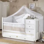 CONVERTIBLE BABY BED